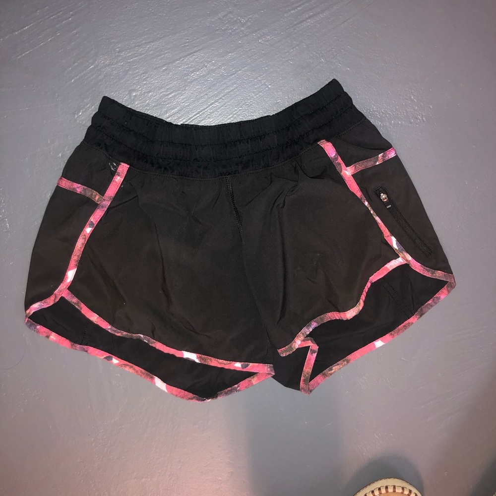 lululemon black shorts with pink design